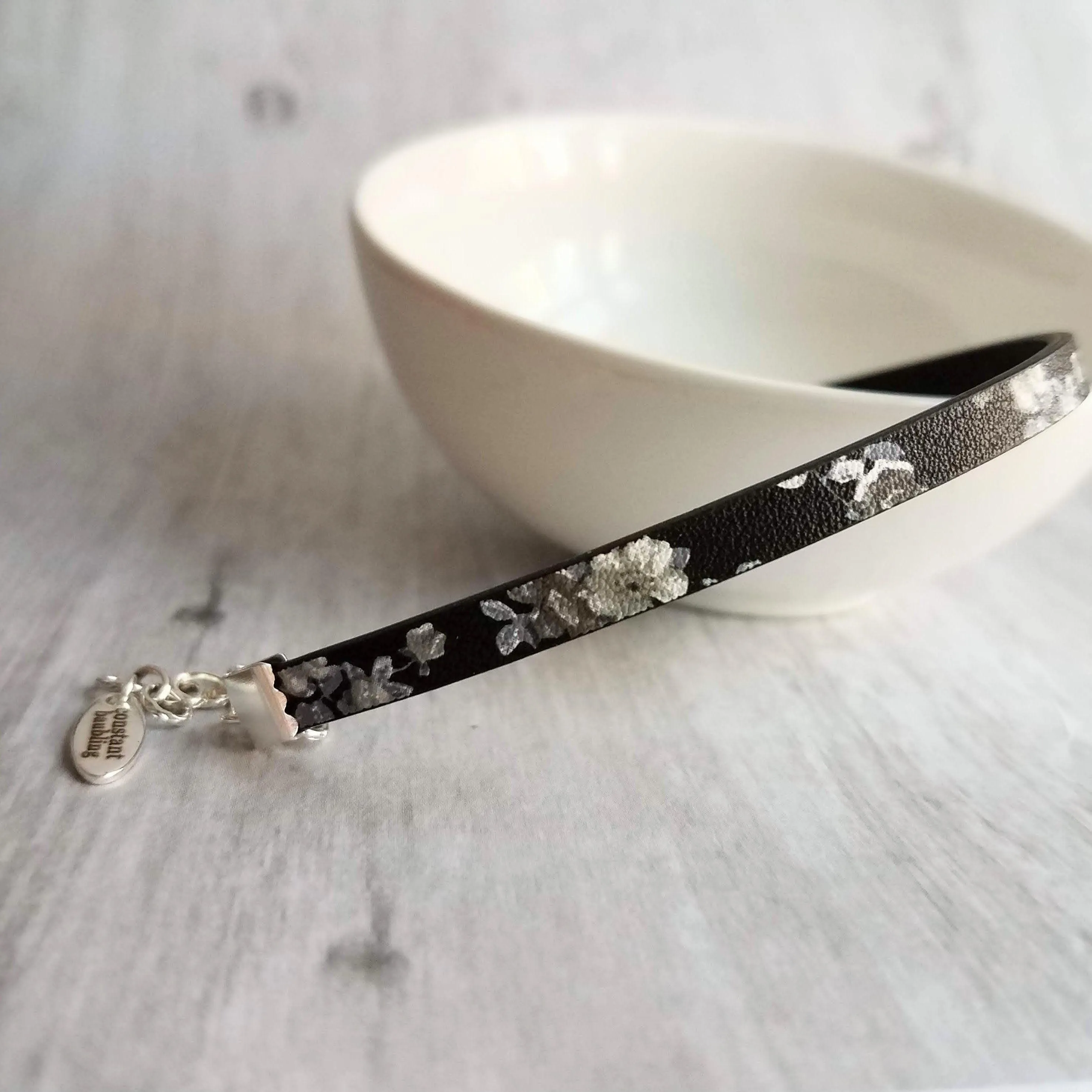 Black Wrap Bracelet, vegan leather bracelet, flat cord bracelet, black floral print, thin black bracelet, slim bracelet, silver chain flower