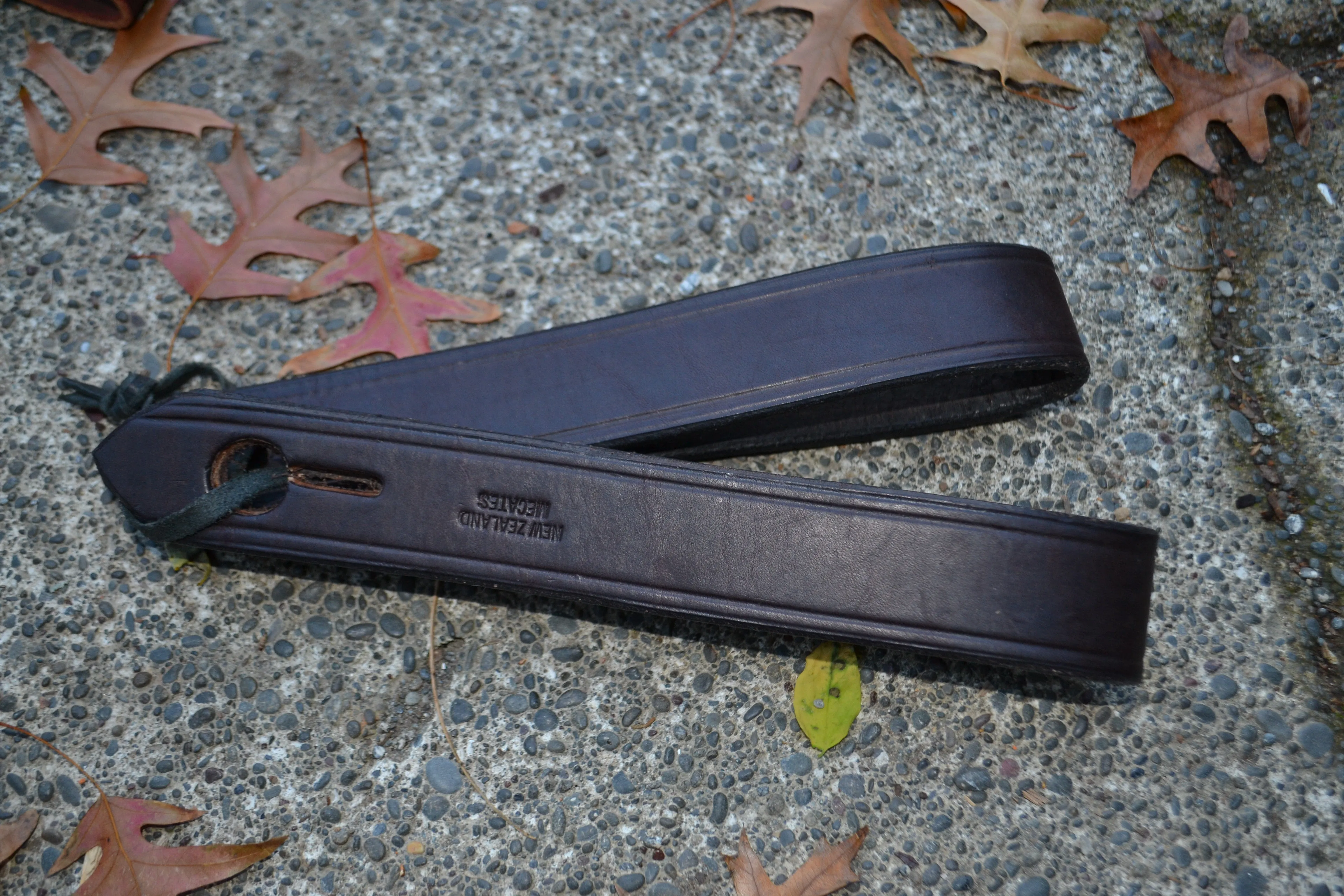Slobber Straps: Long. Dark brown.
