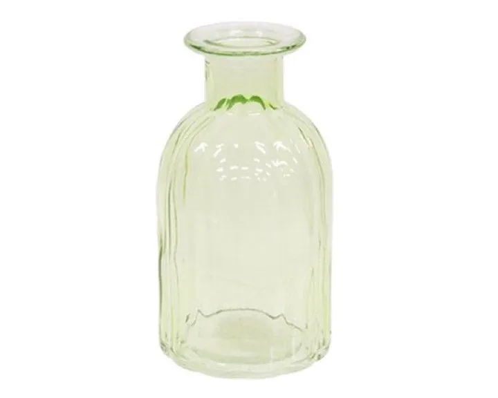 Small beveled green glass bottle vase