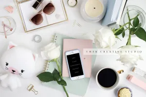 Smartphone, Notebooks and Stuffed Animal Flatlay