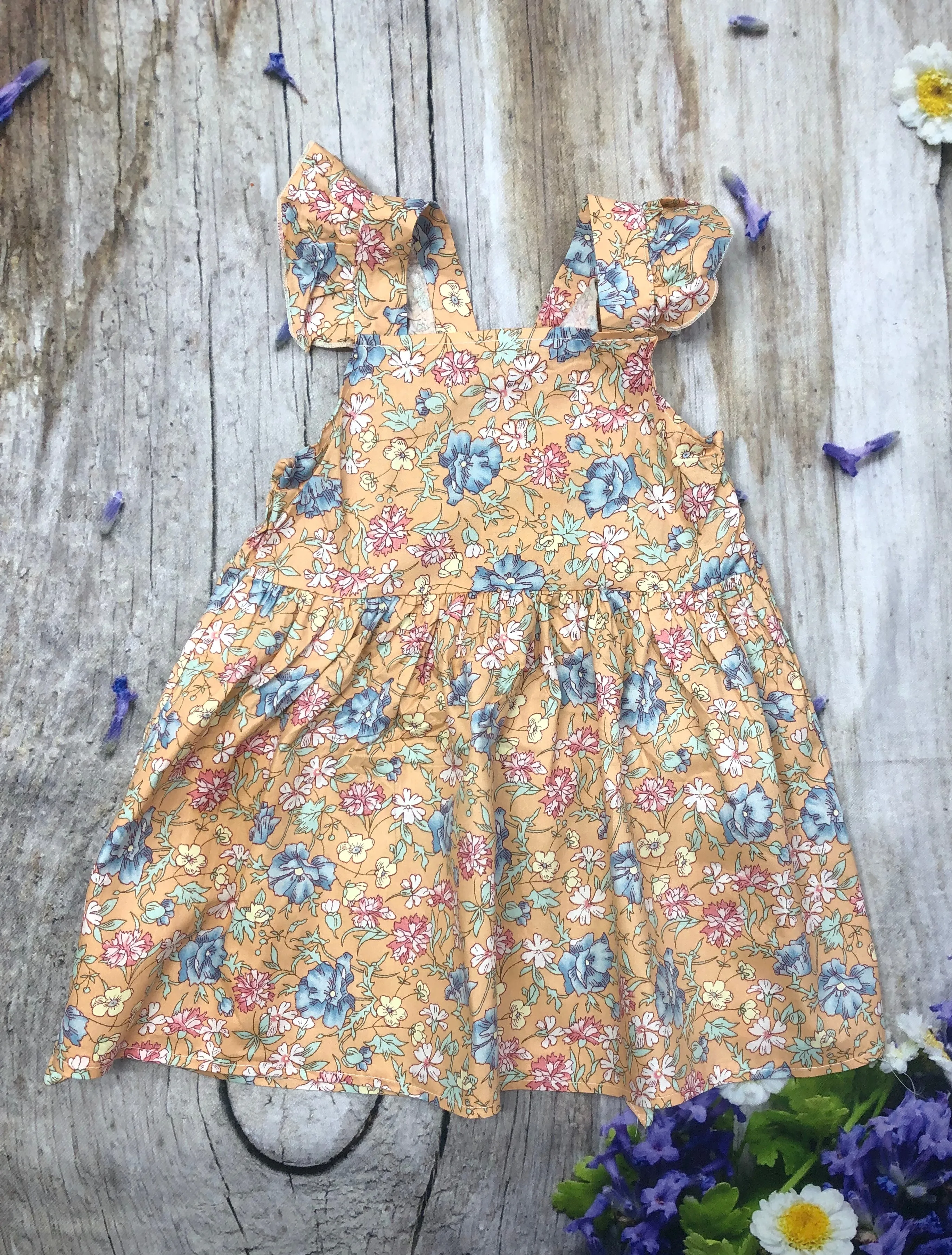 Tangerine floral cross back ruffle dress